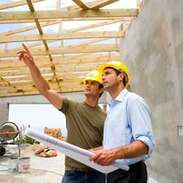 Workers discussing residential construction