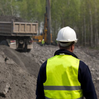 OSHA inspector inspecting worksite