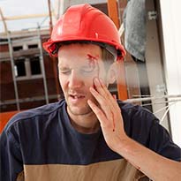 Worker with bloody head wound