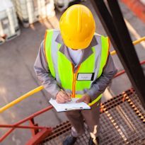 Worker inspecting workplace