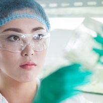 Laboratory worker wearing eye protection