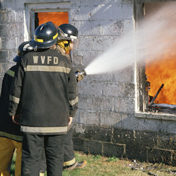 Image of Firefighters fighting a fire