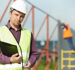 Image showing an inspector observing work at a job site