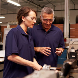 Image showing a supervisor providing On-the-Job training