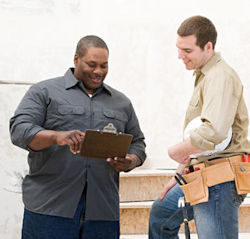 Image A supervisor explaining to another about tough-caring leadership
