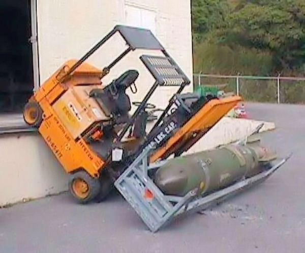 Image showing forklift with a load, that has fallen off a loading dock