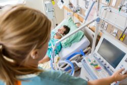 nurse checking patients status