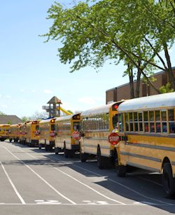 School parking lot with busses lined up