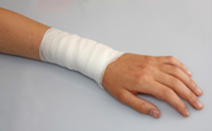injured arm with a bandage
