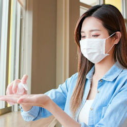 Worker cleaning hands.