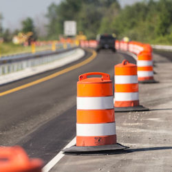 Traffic safety drums lining roadway