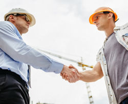 Employer shaking hands with a worker.