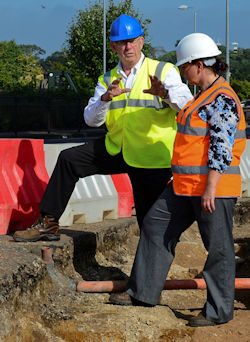 Safety manager talking to another employee.