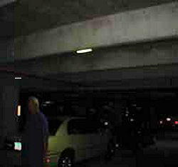 parking area with dim unsafe lighting