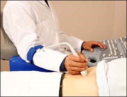 Ultrasound tech using proper ergonomic technique.