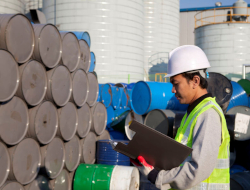 designated qualified person evaluating stacks of metal containers
