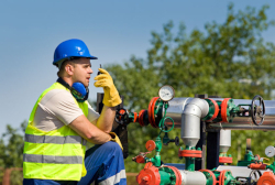 designated qualified person outside performing a detailed evaluation of pipes and valves