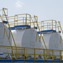 Three giant outdoor stationary containers