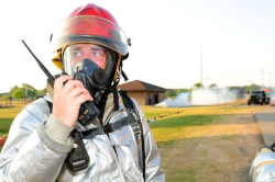 worker using a 2-way radio