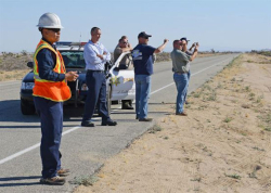 Workers beginning to establish site security perimeter