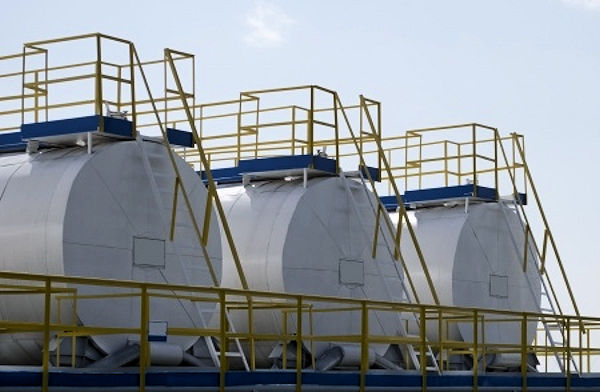 3 giant outdoors storage tanks