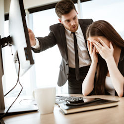 Manager causing a stressful situation by threatening an employee