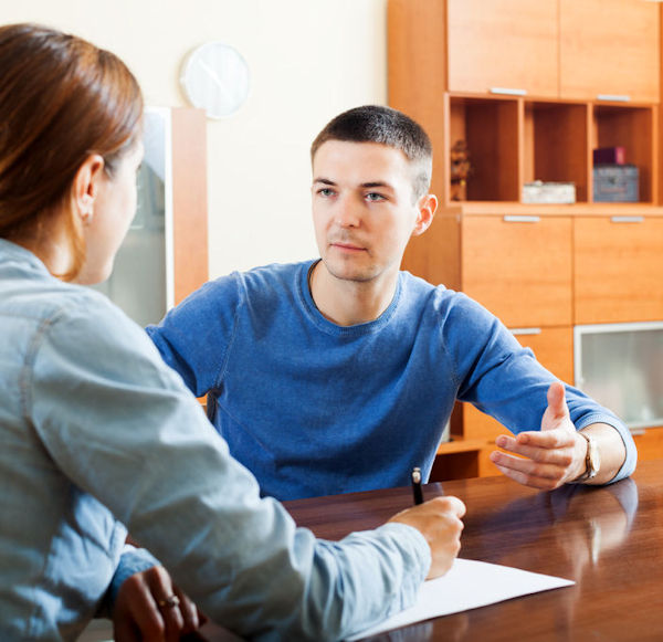 An employeer interviewing a employee