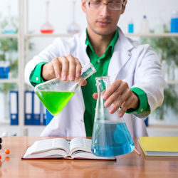 Worker mixing chemicals