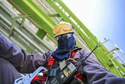 Employee dressed with the proper PPE to do the job