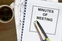 Stack of papers labeled Safety committee meeting minutes