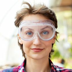 Worker wearing safety goggles