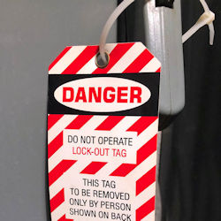 Danger tag placed as an additional safety measure.