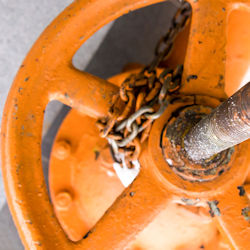 Chain placed on wheel to prevent the opening of a valve.