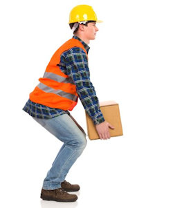 Worker lifting a box using the legs