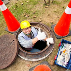 Worker in a manhole