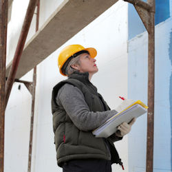 worker inspecting scaffold