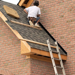 roofer depending on installed fall protection