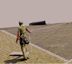 Worker on roof with lifeline