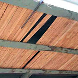Broken bridge platform where a worker fell through.