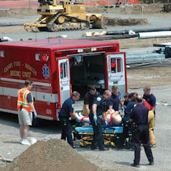ambulance and patient on work site