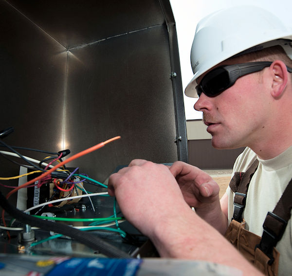 Electrician installing wiring.
