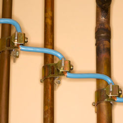 Image of green ground wire straps.