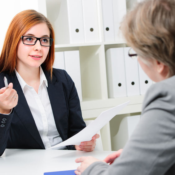 Image of manager and employee meeting