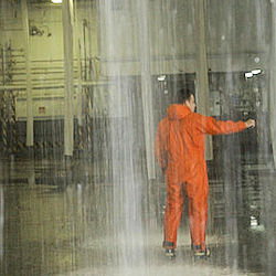 Worker in warehouse the Fire Suppression System is activated.