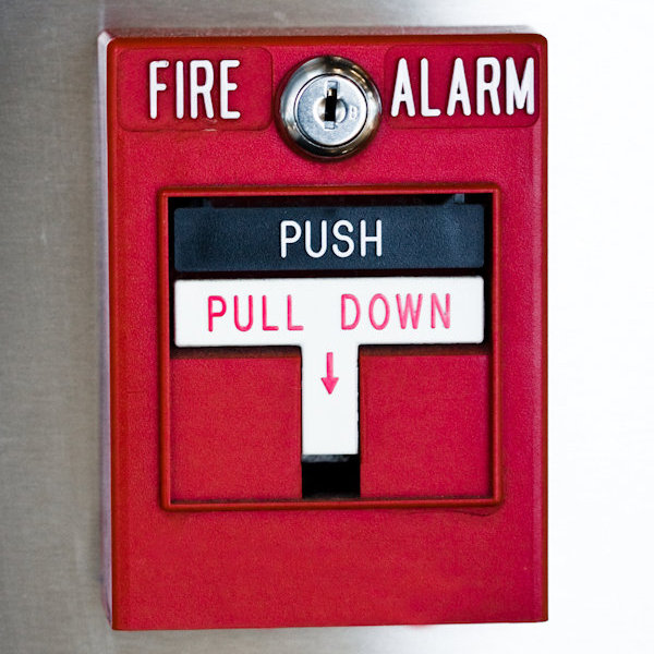 Common Fire Alarm mounted on wall.