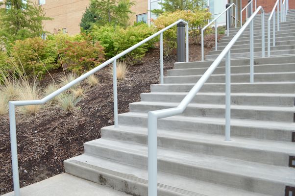Outdoor stairway with handrails.