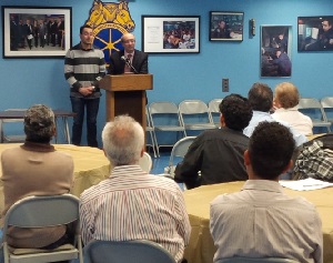 Supervisor holding drivers safety meeting.