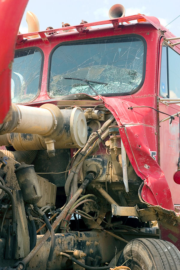 Big rig with front end damage.