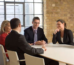 Group planning meeting around a table.