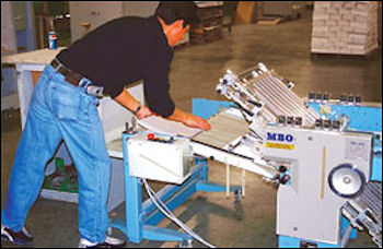 Image showing employee analyzing equipment for ergonomic issues